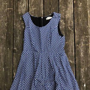 Tea-length blue polka dot dress by Molly Bracken